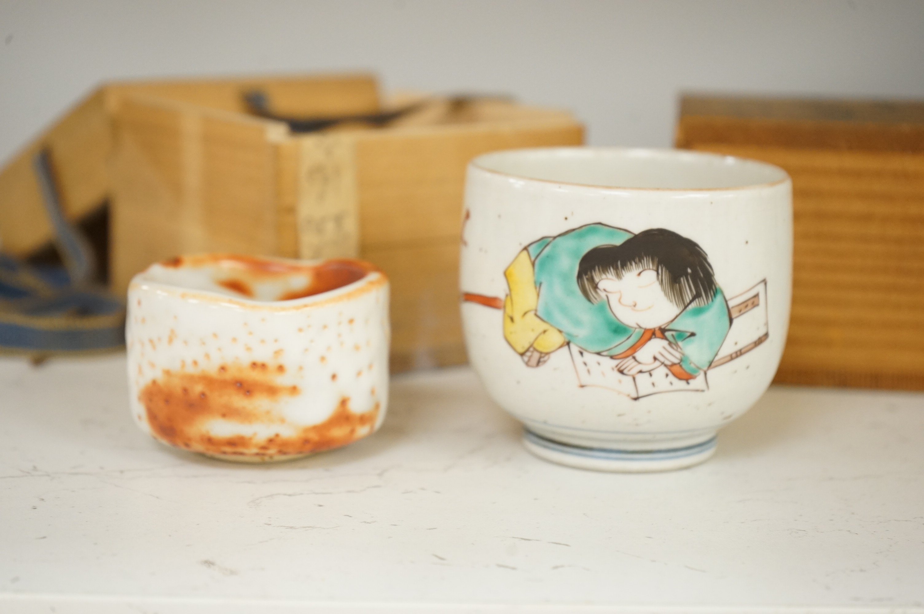 Two Japanese Mino ware sake cups, boxed, largest 7cm tall
